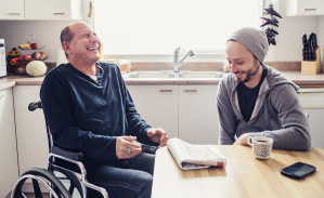 Men wheel chair talking